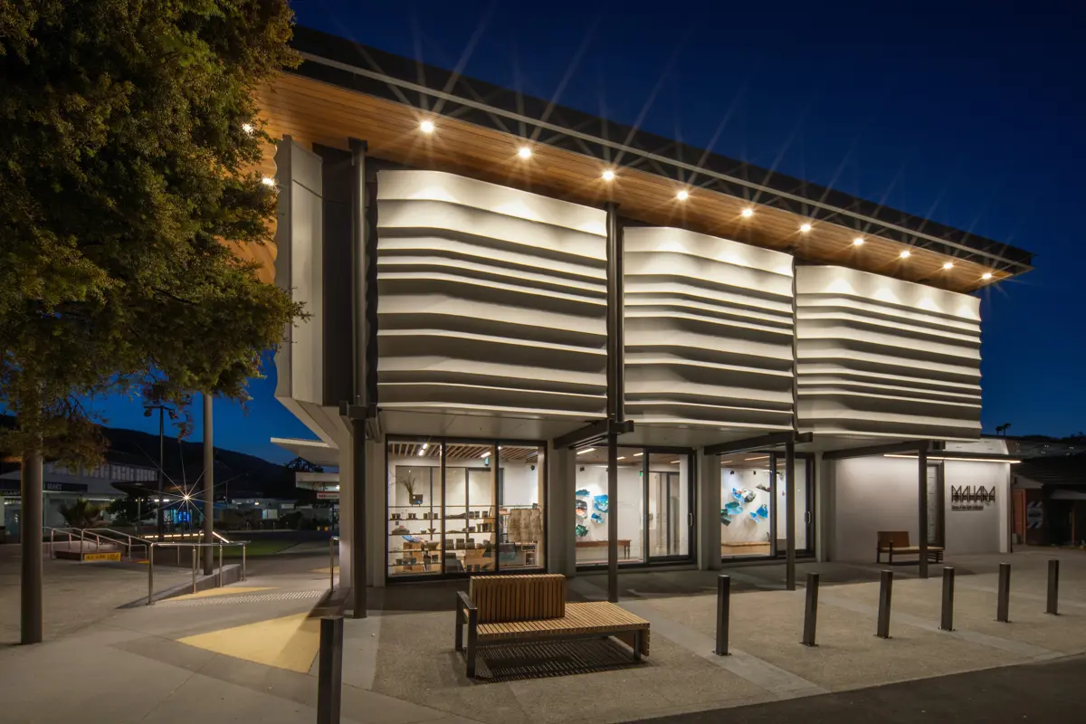The outside of Toi MAHARA gallery lit up at night