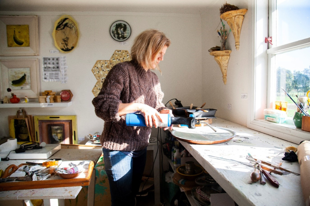 Sculpture and encaustic artist at Studio Reset at work