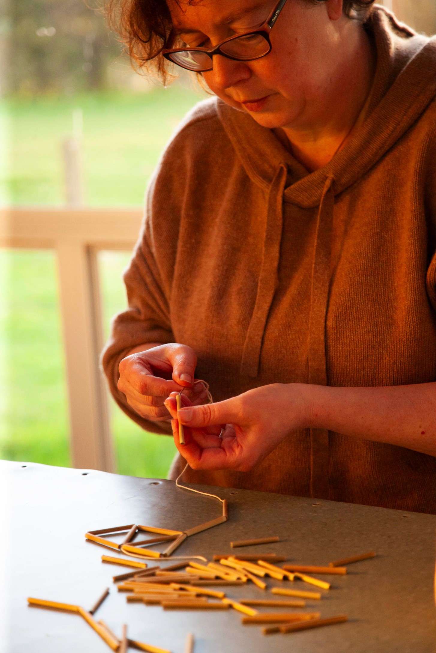 Sculpture and fibre artist Birgit Moffat at work.
